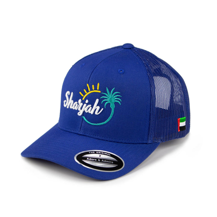 Sharjah Cap - Just Adore - Blue cap with Sharjah logo and palm tree Embroidery in poly cotton fabric and netted fabric in back it is unisex cap